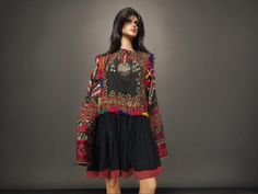 antique Afghanistan nuristan Woman embroidered weding Dress jumlo antique afghan Nomadic Tribal Dress Nuristan. Silk embroidery on cotton; buttons, metal ornaments. 187 cm across the shoulders; 88 long and chest width 57 cm .  This lavishly embroidered dress is in good condition Dress with various ages of embroidery and materials. Circa 1900 to 1990 Nuristan (Kafiristan) Northeastern Afghanistan Looks Greek? For 2000 years these people have kept the Selucid artistic style following Alexander the Bohemian Traditional Wear With Pallu And Long Sleeves, Bohemian Long Sleeve Dress With Motifs, Bohemian Traditional Wear With Long Sleeve And Dupatta, Bohemian Ceremonial Dupatta With Dabka Work, Bohemian Dabka Work Dupatta For Ceremonial Use, Bohemian Dupatta With Dabka Work For Ceremonial Use, Bohemian Embroidered Fabric For Ceremonial Use, Wedding Headdress, Embroidered Wedding Dress