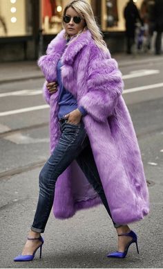 Elodie Purple Long Faux Fur Long Coat for Women Women's Faux Fur Long Coat: A stylish and trendy knee-length coat made from high-quality faux fur. Ultra-thick, fluffy, and cozy: Designed to provide maximum warmth and comfort in cold weather. Vibrant colours: Available in yellow, blue, and purple, adding a touch of brilliance to any outfit. Generous length for extra coverage: Reaches below the knee, creating an elegant and glamorous silhouette. Insulating and warm: The faux fur material ensures p Knee Length Coat, Long Faux Fur Coat, Moda Chic, Women Overcoat, Collared Coat, Turndown Collar, High Fashion Street Style, Inspiration Mode, Mode Vintage