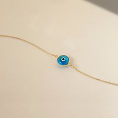 1- D E S C R I P T I O N Protect yourself with a touch of elegance wearing this 14K Solid Gold Blue Evil Eye Bracelet for Women, featuring a captivating blue evil eye design that adds a beautiful and stylish charm to your wrist. 2- P R O D U C T ∙  F E A T U R E S * Gold Material: 14K solid gold * Gold Color Options: Yellow gold, Rose gold, White gold * Chain Length Options: 5", 5.5", 6", 6.5", 7" +1" Extender * Dimensions:  Height: 9 mm / 0.35 in 3- D E L I V E R Y ∙ D E T A I L S We understand Adjustable Turquoise 14k Gold Jewelry, Adjustable 14k Gold Turquoise Jewelry, Fine Jewelry Turquoise Gemstone Bracelet, Turquoise Fine Jewelry Bracelets For Gift, Fine Jewelry In 14k Gold With Light Blue Color, Elegant Round Turquoise Bracelet, Light Blue 14k Gold Fine Jewelry, Elegant Turquoise Round Bracelet, Elegant Turquoise Jewelry With Evil Eye