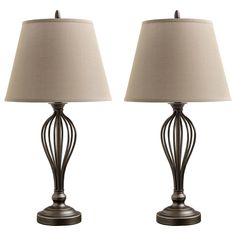 a pair of lamps sitting next to each other