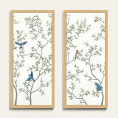 two framed pictures with birds on them in front of a white background and tree branches