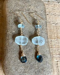 Gold filled dangle earrings with faceted London blue topaz, aquamarine, and Quartz crystal gemstones Chip Jewelry, London Blue Topaz Earrings, Pebble Jewelry, Gold Dangle Earrings, Moon Pendant Necklace, Blue Topaz Earrings, Topaz Earrings, Aquamarine Gemstone, Bridal Gold Jewellery