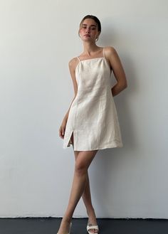 Beige linen dress, Linen backless dress, Summer mini dress for women, Sleeveless strappy dress, Open back strap dress, Sundress with slit Handmade linen dress suitable for any occasion in the summer season. It's a must-have dress for all-day, casualwear, and beachwear - perfect for your vacation. Linen makes the best micro-climate of the skin, is breathable, and absorbs moisture and perspiration. The straps in this model are adjustable and you can tie them in different ways and at the length that suits you the most. It also allows adjusting how high the neck is. It is super comfortable to wear yet a fashionable sundress, minimalist and simple. ■ color: beige ■ material: 100% linen ■ style: - Mini-length dress - No sleeves - Low back - Adjustable spaghetti straps - Relaxed fit - Double-line Low Back Linen Dress, Beach Linen Dress, Mini Linen Dress, Back Strap Dress, Beige Linen Dress, Simple Linen Dress, Beige Mini Dress, Linen Summer Outfits, Micro Climate