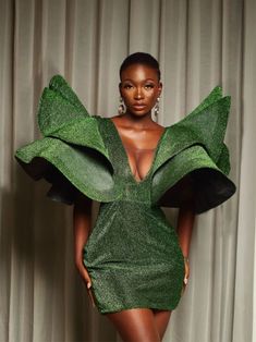 This beautiful custom-made mini dress is a must-have for any evening occasion. It is designed with two layered-detail and deep v-cut. Green Dress Photoshoot Ideas, Emphasis Dress, Beauty Photoshoot Ideas, Sculptural Dress, Green Formal Dress, Mobile Display, Beautiful Maxi Dresses, Layered Dress, فستان سهرة