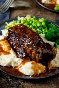 Slow Cooker beef short ribs. Fall-apart beef served with a rich and red wine gravy. This is serious comfort food. Crockpot Beef Short Ribs With Rich Gravy, Beef Ribs Recipe Slow Cooker, Short Rib Recipes Crockpot, Slow Cooker Beef Short Ribs, Slow Cooker Ribs Recipe, Slow Cooker Lentil Soup, Wine Gravy, Short Ribs Slow Cooker, Red Wine Gravy