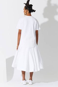 White cotton circular flare skirt with princess panelled waistband and horse hair attached to the hemline. - Aza Fashions White Cotton Dress With Voluminous Skirt, Elegant Cotton Skirt With Ruffle Hem, Fitted Cotton Skirt With Layered Hem, Daywear Dresses With Gathered Skirt, Full Skirt Dress With Ruffle Hem, Cotton Skirt With Ruffle Hem For Daywear, White Ruffle Hem Skirt For Daywear, Cotton Dress With Relaxed Ruffled Skirt, Daywear Dresses With Pleated Skirt