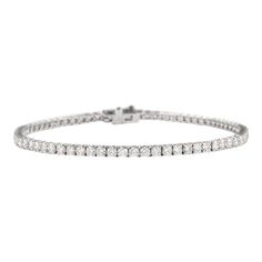 Exquisite and timeless diamonds tennis bracelet, by Alexander Beverly Hills. 65 round brilliant diamonds, 3.96 carats total. Approximately G/H color and VS clarity. Four prong set in 18k white gold, 8.20 grams, 7 inches.  Accommodated with an up-to-date digital appraisal by a GIA G.G. once purchased, upon request. Please contact us with any questions. Classic White Tennis Bracelet With Pave Setting, Classic Pave Setting Tennis Bracelet, Platinum Tennis Bracelet With Pave Setting, Classic White Gold Tennis Bracelet With Pave Setting, Classic Diamond Tennis Bracelet With Pave Setting, Classic Tennis Bracelet With Pave Setting, Diamond Tennis Bracelet, Tennis Bracelet Diamond, Pink Bracelet