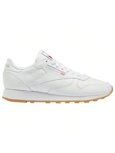 Blending high fashion and street style, the Reebok Classic Leather N/Core pays homage to iconic Reebok heritage. Boasting a soft leather upper that adds a refined look, these shoes also feature an EVA midsole for an incredible bounce with every step. The high-abrasion rubber outsole delivers the grippiest stride and returns confidence with each step. Celebrate clean and classic style in the Reebok Classic Leather N/Core.  Classic lace-up design delivers the perfect fit. High-cushion molded sockl Reebok Classic Leather, Reebok Classic, Outdoor Shoes, Classic Leather, White White, White Collar, Running Shoes For Men, Sports Equipment, Soft Leather