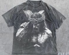 Jesus Holding Cross Vintage Halftone 90s Graphic Shirt, Retro Faith Jesus Shirt, Christian Shirt, Retro Graphic Bible Tee, Be The Light. Use this stunning shirt to up your style game. Crafted with great care from premium materials, it seamlessly blends elegance and comfort. This versatile shirt is ideal for both semi-formal and casual settings. Its timeless design exudes sophistication and complements any ensemble with ease. You might redefine your fashion quotient and steal the show with this s Vintage Shirt Designs Graphic Tees, Christian Scriptures, Christian Graphic Tees, Christ Quotes, Summer Graphic Tee, Christian T Shirts, Be The Light, Jesus Shirt, Vintage Silhouette