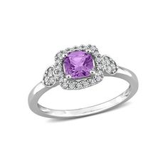 Commence the new phase of life with this delicate Halo Promise Ring. Crafted in sparkling sterling silver, this petite ring features a cushion-cut, prong-set amethyst gemstone at the center surrounded by 20 round-cut, buttercup-set diamonds arranged in a halo design. This classy ring also showcases six round-cut, pave-set diamonds placed on the sides in a heart design. Polished to brilliance, this dainty ring will always be a symbol of unconditional love and commitment. 5/8 Carat (ctw) Amethyst New Phase Of Life, Classy Ring, Petite Ring, Halo Design, Halo Diamond Ring, Dainty Ring, Amethyst Gemstone, Amethyst Ring, Cushion Cut