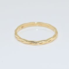 14k Solid Gold Dainty Twist Ring. Real Gold Twisted Band Rope Ring. Elegant Wedding Band. Premium Fine Jewelry For Her.  💙 Our jewelry is handcrafted with love and great care at San Francisco Bay! All of our items are 14k stamped for authenticity. 💙 You will receive them exactly as pictured. We don't use any filters, all photos are authentic and unedited.  💙 Band Width is 2.00 mm. 💙 We're offering the finest quality in solid gold jewelry. 💙 Quick shipping - Your order will be handcrafted an Adjustable Yellow Gold Stackable Rings With Diamond Cut, 14k Gold Band Jewelry For Wedding, Stamped 14k Band Jewelry For Wedding, Formal 14k Gold Band Rings, Yellow Gold Stackable Rings For Wedding, Hallmarked, 14k Gold Round Jewelry With Decorative Band, 14k Gold Jewelry With Decorative Band, Yellow Gold Hallmarked Stackable Rings For Wedding, Yellow Gold Stackable Wedding Rings Hallmarked