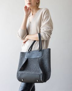 Compact and thoughtfully designed, the Frankie Midi offers timeless sophistication in a smaller profile. With a magnetic closure and two inside pockets, this bag is the ideal size for carrying your daily essentials with ease. Lightweight and refined, it’s perfectly suited for on-the-go moments, from casual outings to more polished occasions. A petite powerhouse for effortless versatility.

 *Please Note: Gift Boxes not available for this item. We recommend the Large Furoshiki to wrap Frankie Tot Crossbody Tote Bag, Nickel Hardware, Architectural Inspiration, Crossbody Tote, Daily Essentials, Vegetable Tanned Leather, Magnetic Closure, Leather Handle, Gift Boxes