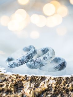 A beautiful pearled white faceted resin ring with silver flakes inside. This resin ring is perfect for stacking! It's faceted all the way around and it is so comfortable to wear. All my resin rings are handmade with self-made molds. they are also hand-sanded and polished, to be smooth and comfortable to wear. Given the nature of the resin, my rings may contain tiny bubbles and imperfections, but I always try to make them as perfect as possible. The listing is for ONE stacking ring with metal fla Handmade Minimalist White Crystal Ring, Minimalist Silver Resin Jewelry, Minimalist Handmade White Crystal Ring, White Sterling Silver Iced Jewelry, Iced White Sterling Silver Jewelry, Handmade Elegant Resin Rings, Elegant Handmade Resin Rings, White Round Resin Jewelry, White Embellished Jewelry For Anniversary