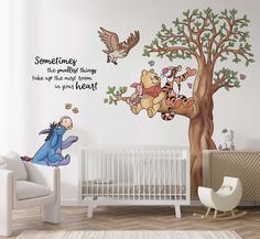 winnie the pooh wall decal in a child's room with an animal tree