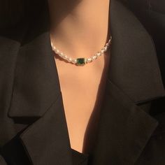 Handcrafted with care, this necklace features lustrous baroque pearls and vibrant emerald green gemstone, elegantly arranged to create a stunning contrast. The rich green hues of the emeralds complement the shimmering pearls, making this necklace a timeless and versatile accessory. Features: Handcrafted Elegant and versatile design Perfect for both casual and formal occasions Makes a thoughtful gift for someone special Specifications: Material: Emerald green zircon, cultured baroque pearls Lengt Pearl And Emerald Necklace, Green Pearl Pendant Jewelry For Formal Occasions, Green Pearl Pendant Necklace For Formal Occasions, Formal Green Necklace With Pearl Pendant, Elegant Green Pearl Drop Necklaces, Elegant Green Necklaces With Pearl Drop, Green Jewels Necklace For May Birthstone, Formal Green Pearl Pendant Jewelry, Elegant Green Emerald Necklace With Jewels