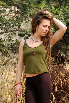 Regular top with cut Green Stretch Cotton Crop Top, Green Relaxed Fit Cotton Crop Top, Cotton Relaxed Fit Crop Top Tank, Relaxed Fit Cotton Crop Top Tank, Stretch Cotton Cropped Tops, Green Cropped Cotton Tank Top, Womens Halter Tops, Halter Tops, Green Man