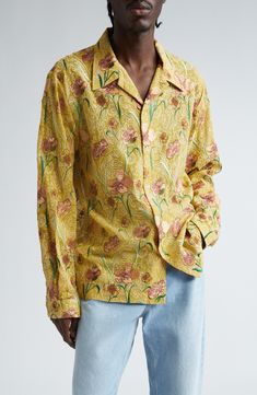 Embroidered hibiscus blooms and paisley flourishes brighten a camp shirt tailored from lightweight viscose with a straight hem to keep you untucked and casual. 29" length; 45" chest (size Medium) Front button closure Notched collar Long sleeves with button cuffs 100% viscose Dry clean Imported Designer Clothing Yellow Floral Print Silk Tops, Yellow Silk Top With Floral Print, Summer Silk Shirt With Floral Print, Silk Shirt With Floral Print For Summer, Relaxed Fit Shirt With Floral Embroidery And Camp Collar, Relaxed Fit Tops With Floral Embroidery And Spread Collar, Summer Floral Embroidered Top With Spread Collar, Summer Top With Floral Embroidery And Spread Collar, Silk Shirt With Floral Print And Spread Collar