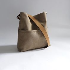 Urban-chic style crossbody bags that are neutral in color and effortlessly casual. When you need a mid-sized bag with easy access front pockets, just the right amount of not-too-slouchy shape and the perfect neutral shade, our updated take on the modern hobo bag is sized just right for everyday, on-the-go use. This listing is for the MEDIUM size bag in Khaki canvas. Hobo Bags For Women, Canvas Hobo Bag, Urban Chic Fashion, Hobo Bags, Waxed Canvas, Urban Chic, Crossbody Strap, Hobo Bag, Have A Great Day