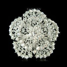 "PERFECT GIFT /WEDDING GIFT FOR BRIDE / BRIDESMAIDS / LADY! This is a Brand New, stunning Swarovski Crystal Circle Flower Brooch. The brooch is made with Swarovski crystals measuring 2 1/8\" wide X 2 1/8\" high (55mm X 55mm). Crystal Color: Crystal Clear I have customer add a comb to it can then convert it to a hair comb. This item is proudly approved by Sarah from Etsy Marketplace Integrity team. Prices are in US$. For shipping policies and other important information, click on \"profile\" on t Flower Shaped Wedding Brooch, Flower-shaped Wedding Brooch, Sparkling Floral Jewelry For Wedding, Sparkling Flower Jewelry For Wedding, Sparkling Flower Shaped Jewelry For Weddings, Sparkling Flower-shaped Jewelry For Wedding, Sparkling Flower-shaped Wedding Jewelry, Silver Rhinestone Brooches For Wedding, Elegant Crystal-embellished Brooches For Weddings