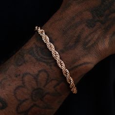 Introducing the Rope Bracelet in 6mm, a bolder version of the classic. This high-quality piece is crafted in 14k Rose Gold, featuring an intricate interwoven pattern that will ensure long lasting shine and durability. Pair it with the matching Rope Chain in Rose Gold-6mm that will tie your whole look together! This product is guaranteed for life – GLD will repair or replace the item should you experience any defects in craftsmanship or breakage. Specifications - Width: 6mm - Length: 6", 7", 8", Classic Gold Bracelet With Rope Chain, Classic Gold Rope Chain Bracelet, Classic Rope Chain Bracelets For Formal Occasions, Classic Formal Rope Chain Bracelets, Classic Formal Rope Chain Bracelet, Classic 14k Gold Bracelet With Rope Chain, Classic Rose Gold Bracelet With Diamond Cut, Classic Diamond Cut Rose Gold Bracelet, Classic Rose Gold Diamond Cut Bracelet