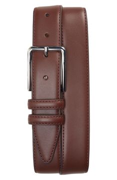 Hearty leather construction defines a belt fitted with a sleek buckle for a bit of shine. 1 1/4" belt width; 2" x 1 3/4" buckle Leather Imported Fitted Leather Belts And Suspenders, Modern Brown Belts For Office Wear, Elegant Brown Leather Belts And Suspenders, Elegant Brown Leather Belt And Suspenders, Elegant Bridle Leather Belts For Work, Elegant Bridle Leather Work Belts, Elegant Formal Bridle Leather Belt, Classic Brown Belt Buckle For Office, Leather Belt Buckles With Belt For Office