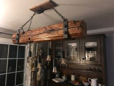 an old wooden beam hanging from the ceiling