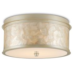 a semi flush light fixture with white marble