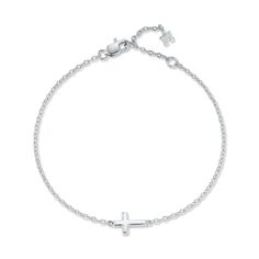 Mini Cross Bracelet This sleek bracelet is the perfect everyday cool bracelet. You will not want to take it off. Looks perfect layered or worn alone. Made in New York of solid sterling silver. Sterling Silver 1.50gm sterling silver White Rhodium plated 7.5" in Total Length Lobster Lock Made in New York Minimalist White Gold Bracelet With Silver Chain, Minimalist White Gold Silver Chain Bracelets, Minimalist White Gold Silver Chain Bracelet, Modern Sterling Silver Diamond Bracelet, Adjustable, Modern Adjustable Sterling Silver Diamond Bracelet, Minimalist Sterling Silver Bracelet In White Gold, Classic Sterling Silver Charm Bracelet With Adjustable Chain, Modern Charm Bracelet With Sterling Silver Clasp, Modern Sterling Silver Charm Bracelet