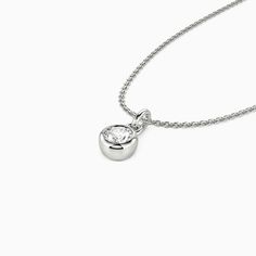 This solitaire necklace features a brilliant round-cut stone set in a highly polished bezel setting, adding dimension to the center stone with a chic appeal. Its timeless design permits it to match any casual or formal attire, and you can customize the stone you prefer.Carat Weight: 0.3 ctStone Size: 4 mmStone Type: Moissanite/GemstoneNumber of Stones: 1 Stone Color: OptionalStone Shape: RoundChain Type: O-chainWidth: 4.8 mmHeight: 6.8 mmThickness: 2.8 mmMaterial: 10K/14K/18K Solid Gold , Platin Solitaire Necklace, Solitaire Necklaces, Formal Attire, Christmas Sale, Stone Settings, Bezel Setting, Personalized Jewelry, Round Cut, Stone Color