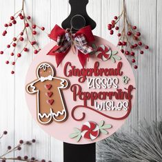 a gingerbread christmas ornament hanging from a pole