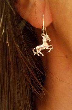 "These Beautiful Elegant Handcrafted Equestrian Jewelry genuine .925 Sterling Silver Small Galloping Horse Earrings, it's a perfect addition for the horse lovers jewelry,wonderful for everyday and petite enough to wear showing. Small Pieces .925 Sterling Silver Horse : 1/2\" by 1/2\" Weight .=2.3 grams" Classic Sterling Silver Horseshoe Jewelry, Classic Horseshoe-shaped Sterling Silver Jewelry, Elegant Horse Design Jewelry For Shows, Elegant Jewelry With Horse Design For Shows, Silver Sterling Silver Jewelry For Shows, Adjustable Sterling Silver Horse Design Jewelry, Nickel-free Horseshoe Sterling Silver Jewelry, Elegant Sterling Silver Jewelry With Horse Design, Elegant Sterling Silver Jewelry For Shows