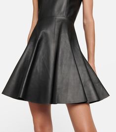 Leather minidress in black - Alaia | Mytheresa Modern A-line Mini Dress For Party, Fitted A-line Leather Dress, Structured Boning Mini Dress, Modern A-line Mini Dress For Evening, Modern A-line Dress For Night Out, Luxury Leather Dresses For Formal Occasions, Classic Lined A-line Mini Dress, Luxury Fitted A-line Mini Dress, Fitted Leather Mini Dress