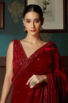 Shop for Priyanka Jain Red Velvet Pre-draped Saree With Blouse for Women Online at Aza Fashions Festive V-neck Saree With Dupatta, Formal Embellished Pre-draped Saree For Diwali, Anarkali Pre-draped Saree With Sequins For Diwali, Festive Evening Anarkali Blouse Piece, Embellished Chinon Blouse Piece, Formal Sequined Saree For Festive Occasions, Formal Festive Sequined Saree, V-neck Bollywood Pre-draped Saree With Zari Work, Evening Anarkali Saree With Mirror Work