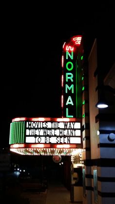 the marquee is lit up at night time