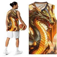 a man holding a basketball while standing next to a shirt with a dragon on it