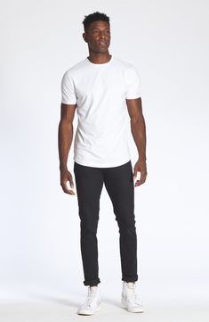 A curved hem enhances the fit of this versatile crewneck T-shirt made from a soft cotton blend. Crewneck Short sleeves 62% polyester, 33% cotton, 5% spandex Machine wash, dry flat Imported Charleston Style, Denim Streetwear, My Christmas List, Be Clean, Denim T Shirt, Teen Fashion, Gq, Christmas List, Cotton Spandex