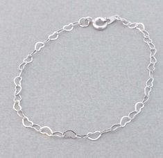 Silver Heart Chain Bracelet. This bracelet is Simple, Personal, Beautiful, Special  Perfect for gift to Bridesmaids, friends, mother and yoursilf. -  7 inches long Tarnish Resistant Rhodium Plated chain ► If you would like your bracelet longer or shorter, please send message to me at checkout. **This beautiful Bracelet is handcrafted and made to order. ►► PLEASE INDICATE your desired chain length at Checkout: 6-8 inches         Otherwise will be made at 7inches Gold version available I can make Personalized Silver Bracelets, Heart Chain Bracelet, Infinity Charm Bracelet, Gold Heart Bracelet, Silver Heart Bracelet, Jewelry Heart, Bracelet Dainty, Heart Chain, Simple Bracelets