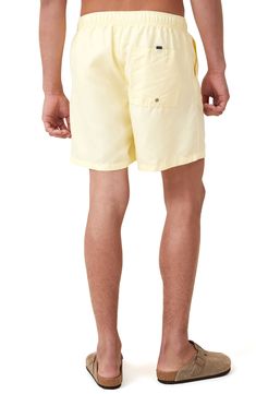 Cool and comfortable in lightweight fabric, these shorts have a stretchy waistband for pull-on-and-go ease. 6" inseam; 11 3/4" front rise Elastic/drawstring waist Front slant pockets; back hook-and-loop patch pocket 100% polyester Machine wash, line dry Imported Casual Solid Color Short Leg Swim Trunks, Casual Bottoms With Short Inseam For Poolside, Relaxed Fit Short Swim Trunks, Casual Yellow Swim Trunks With Built-in Shorts, Summer Nylon Shorts With Side Pockets, Summer Swim Trunks With Pockets And Short Leg, Solid Color Swim Trunks With Side Pockets For Summer, Beach Athletic Shorts With Pockets And Relaxed Fit, Casual Swim Trunks With Elastic Waistband