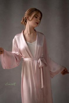 This robe is perfect as wedding robe/sleepwear.100 % designed and handmade by Emsilk. I am pleased to offer your garments made to measure at no extra cost. * Detail: - Pale pink 100% pure silk robe (many other colors are available)- Matching belt is included- Shawl collar style- Midi length/ other length as requested- Best quality silk, 100 % pure mulberry silk and hugs your body so smoothly that you will not want to take it off. I can give small swatch for testing.- The model is 5'8 tall and we Robe For Bride, Robe Bridesmaids, Silk Bridesmaid Robes, Robe Sleepwear, Silk Bridesmaid Dresses, Silk Robe Long, Silk Kimono Robe, Bridal Robe, Wedding Robe