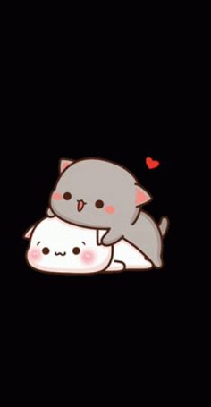 two cats hugging in the dark with hearts on their backs and one cat sitting on top of another