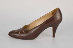 Step into timeless elegance with our Vintage All Leather Pumps in Choco Brown, a symbol of refined sophistication and impeccable craftsmanship. Crafted with care and attention to detail, these pointy toe stiletto heel shoes boast a luxurious all-leather construction, ensuring both style and durability. The rich choco brown hue adds a touch of warmth and versatility to any ensemble, while the patchwork design adds a unique and eye-catching element. Elevate your look with these vintage pumps, perf Classic Formal Court Shoes With 4-inch Heel, Formal Court Shoes With Padded Heel And Almond Toe, Classic Closed Toe Court Shoes For Galas, Classic Court Shoes With Reinforced Heel For Galas, Classic Formal Heels With Almond Toe, Classic High Heel Court Shoes For Galas, Elegant Closed Toe Court Shoes With Leather Sole, Classic Closed Toe Court Shoes For Formal Occasions, Classic Evening Court Shoes With Leather Sole