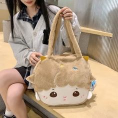 Get ready to turn heads with our Lamb Face Tote Bag! This kawaii fashion bag features a cute and quirky lamb face design. Perfect for adding a playful touch to any outfit (and for carrying all of your essentials)! Bag Size: length 40cm * height 33cm * width 9cm (1-2cm error)Material: Plush/Cotton Kawaii Shoulder Bag With Animal Design For Everyday Use, Kawaii Animal Design Shoulder Bag For Everyday Use, Kawaii Beige Rectangular Shoulder Bag, Cute Shoulder Bag With Animal Design For Daily Use, Cute Animal Design Shoulder Bag For Daily Use, Cute Animal Design Shoulder Bag For School, Cute Cartoon Style Bag, Cartoon Style Cute Rectangular Bag, Kawaii Shoulder Tote Bag With Cute Design