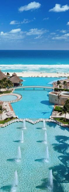 an aerial view of the pool and beach at dreams resort in cancucilla, mexico