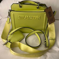 Questions? Leave A Comment Below! Rare Color: Lemon Measurements: 9.25 In L 7.75 In H 4.75 W Body & Trim = 100 % Polyurethane Lining = 100 % Polyester Details: 2 Detachable Shoulder Straps Airpod Case Snap Closure Compartment With 2 Slip Pockets Zipper Closure Compartment With Zipper Pocket Yellow Shoulder Bag For On-the-go, Trendy Yellow Shoulder Bag With Detachable Strap, Modern Yellow Bag With Zipper Closure, Modern Yellow Bags With Zipper Closure, Modern Yellow Bag For Errands, Modern Yellow Shoulder Bag For Errands, Trendy Yellow Double Handle Shoulder Bag, Yellow Rectangular Bag With Zipper Closure, Trendy Yellow Shoulder Bag With Double Handle