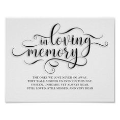 the words in loving memory written on a white poster