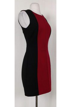 Sophisticated color-blocked dress in a figure flattering silhouette. Great for the office, add a black blazer and flats to elevate this look. Size 2 Concealed back zipper Sleeveless Lined Rounded neckline Black top stitching on fabric Above knee Bust 30" Waist 25" Shoulder to hem 32" Fitted Red Color Block Dress, Red Fitted Color Block Dress, Fitted Color Block Red Dress, Fitted Color Block Work Dresses, Fitted Color Block Dress For Work, Color Block Fitted Dress For Work, Black Color Block Dresses For Work, Colorful Aesthetic, Buy Shoes Online