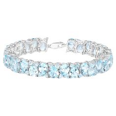 It comes with the appraisal by GIA GG/AJP All Gemstones are Natural 78 Blue Topazes = 58.76 Carats Metal: Rhodium Plated Sterling Silver Length: 7.5 Inches Modern Bracelets, Blue Topaz Stone, Topaz Stone, Nature Bracelets, Tennis Bracelet, Modern Jewelry, Rhodium Plated, Blue Topaz, Citrine