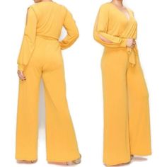 A Classic Split Long Sleeve Bell Bottom Jumpsuit. Comfortable, Lightweight Fabric With Well Constructed Seams And Stitching. Matching Belt Included. Color: Mustard Material: 95% Polyester /5% Spandex Size: 1x Bust: 40'' | Waist: 36'' | Hip: 42'' | Sleeve Length: 27'' Inseam: 26'' | Length: 59 1/2'' | Leg Bottom Width: 15'' Size: 2x Bust: 42'' | Waist: 38'' | Hip: 44'' | Sleeve Length: 27" Inseam: 28'' | Length: 60'' | Leg Bottom Width: 15'' Size: 3x Bust: 44'' | Waist: 40'' | Hip: 46'' | Sleeve Elegant Yellow Long Sleeve Jumpsuit/romper, Elegant Yellow Long Sleeve Jumpsuit, Yellow Jumpsuit For Party, Yellow Stretch Long Sleeve Jumpsuit, Elegant Yellow Jumpsuit For Party, Fitted Yellow Jumpsuits And Rompers For Spring, Fitted Yellow Jumpsuits And Rompers, Chic Yellow Jumpsuits And Rompers For Party, Yellow V-neck Jumpsuits And Rompers For Party