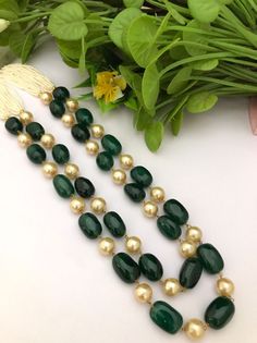 Exclusive quality green emerald facitate beads necklace. AAA super fine quality of emerald green faceted beads necklace. Most eligible gift for someone you love and someone very special for you. Best gift for your anniversary. Best gift for her birthday. Necklace : 1  Earrings : 1 pair Green Gemstone Beaded Necklaces In Temple Jewelry Style, Temple Jewelry Green Gemstone Beaded Necklaces, Green Gemstone Beads Temple Jewelry Necklace, Traditional Green Faceted Beaded Necklaces, Formal Green Necklace With Gemstone Beads, Traditional Green Faceted Beaded Necklace, Traditional Green Gemstone Beads And Cabochons, Green Emerald Gemstone Necklace For Festivals, Green Emerald Necklace With Gemstone For Festivals