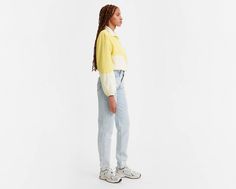 Moms have been coming through with iconic looks since day one, and their late-80s penchant for comfortable, high-waisted jeans is no exception. An elevated take on the timeless Mom Jeans, these '80s Mom Jeans are fitted with a high rise that's more relaxed through your thigh and calf and tapers at the ankle. A vintage-inspired fit updated with a flattering high waist Tapered leg for tailored style Front is slightly pitched forward, a vintage-inspired detail Better clothes. Better choices. We mad Relaxed Fit 90s Inspired Jeans For Fall, 90s Inspired Relaxed Fit Jeans For Fall, Levi's Retro Jeans For Spring, Retro Levi's Jeans For Spring, Retro Levi's Spring Jeans, 80s Mom, Light Wash Levis, Tailored Style, Iconic Looks